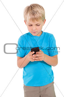 Cute little boy using smartphone