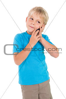 Cute little boy talking on smartphone