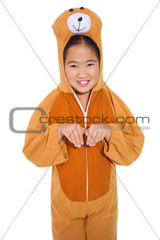 Happy little girl in bear costume