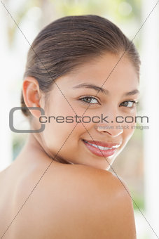 Beautiful brunette smiling at camera