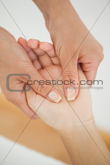 Woman receiving a hand massage