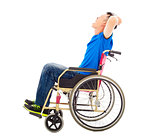  handicapped man sitting on a wheelchair and shouting