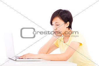 tired woman in front of a laptop, isolated on white background