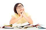 young student girl thinking with book on the desk