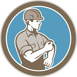 Construction Worker Rolling Up Sleeve Circle Retro