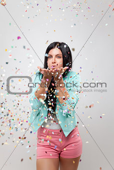 Young beautiful woman in party mood