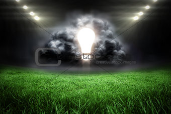 Composite image of light bulb in grey cloud