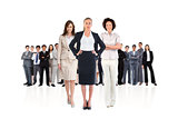Composite image of team of businesswomen looking at camera