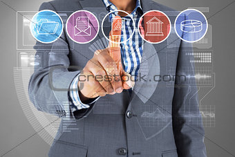 Composite image of businessman pointing at menu