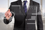 Composite image of businessman in suit pointing finger to interface