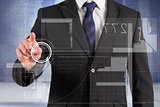 Composite image of businessman in suit pointing finger at interface
