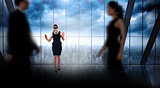 Composite image of business people walking in a blur