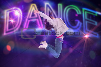 Composite image of cheerful young woman jumping