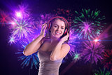 Composite image of pretty girl listening to music