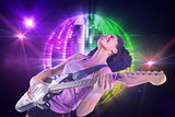 Composite image of pretty girl playing guitar