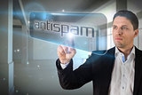 Businessman pointing to word antispam