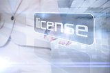 Businesswoman pointing to word license