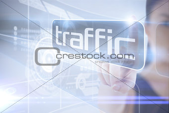 Businesswoman pointing to word traffic