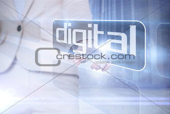 Businesswoman pointing to word digital