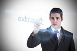 Businessman pointing to word extract