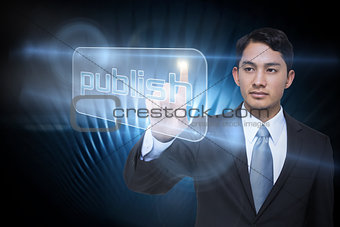 Businessman pointing to word publish