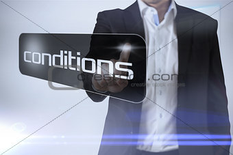 Businessman pointing to word conditions
