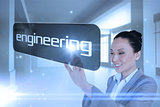 Businesswoman pointing to word engineering