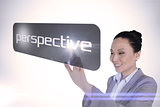 Businesswoman pointing to word perspective