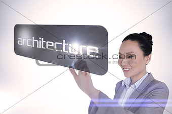 Businesswoman pointing to word architecture