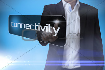 Businessman pointing to word connectivity