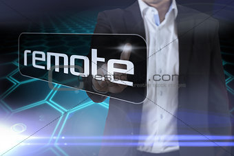 Businessman pointing to word remote