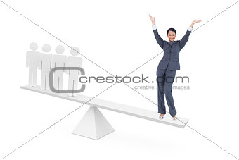Scales weighing cheering businesswoman and stick men