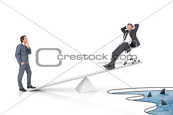 White scales measuring two businessmen