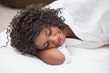 Attractive woman sleeping in bed