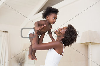 Happy mother with baby girl