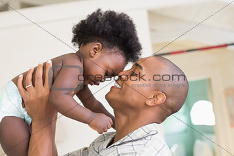 Happy father with his baby girl