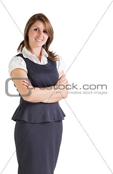 Beautiful young businesswoman with arms crossed