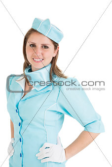 Portrait of a beautiful stewardess dressed in blue uniform
