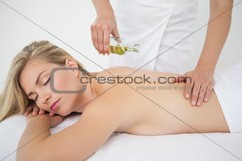 Beautiful blonde enjoying a back massage