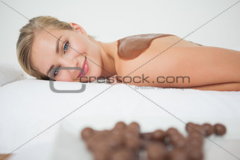 Beautiful blonde enjoying a chocolate beauty treatment