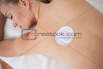 Woman with vacuum cups on her back