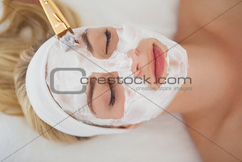 Beautiful blonde getting a facial treatment