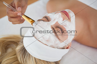Beautiful blonde getting a facial treatment