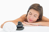 Close up of a beautiful young woman on massage table