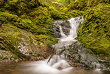 Close-up of small waterfall in the park (Slow shutter speed)