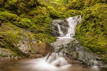Close-up of small waterfall in the park (Slow shutter speed)
