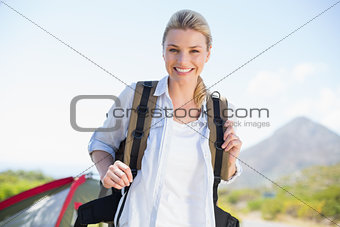 Attractive hiking blonde smiling at camera
