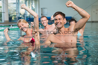 Fitness class doing aqua aerobics
