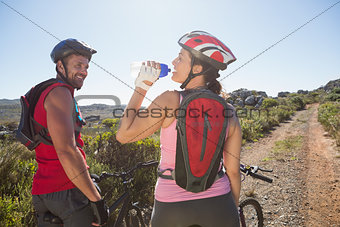 Active couple on a bike ride in the countryside