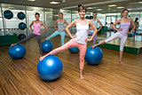 Fitness class using exercise balls in studio